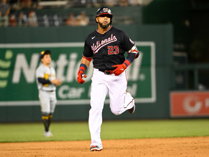 Nelson Cruz circles the bases after hitting a home run against the Milwaukee Brewers.